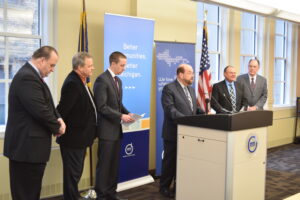 League President and Dearborn Mayor Jack O'Reilly leads a press conference announcing a lawsuit against PA 269.