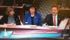 The League's Chris Hackbarth, right, testifies about the proposed OPEB legislation with officials from the Michigan Association of Counties and Michigan Townships Association.