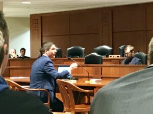 Port Huron City Manager James Freed testifies about the OPEB bill during a state House committee meeting Tuesday morning.