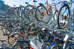 Many train stations in Switzerland provide double deck parking for bicycles.