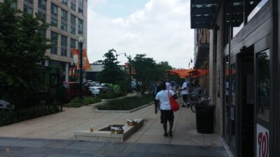 The NoMa neighborhood of Washington DC shows off with wide sidewalks that include shady seating and landscaping for stormwater management, a broad selection of restaurants and food trucks, a new Metro stop--and lots and lots of people.