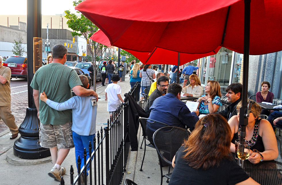 Community Wealth - City Sidewalk with restaurant seating