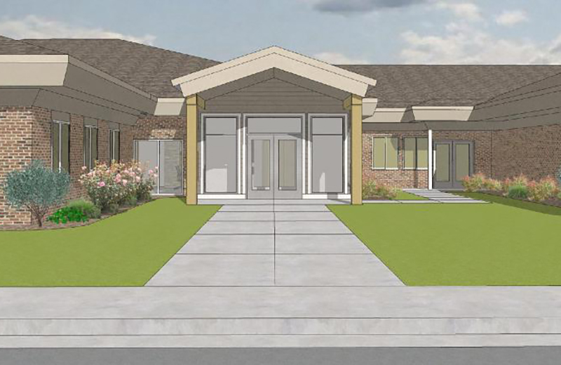 Rendering of the Douglas Civic Retrofit project. It is a one story brick building with many windows, surrounded by landscaping, a sidewalk leads to the front door.