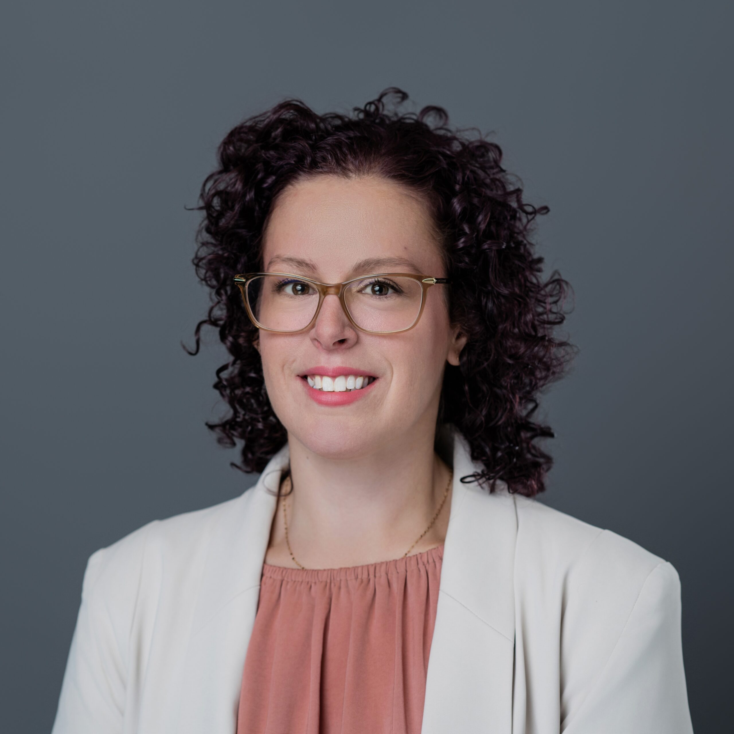 Headshot of Christina Woods.