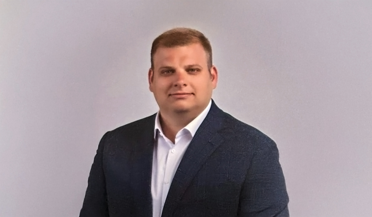 Headshot of Alexander Clos.